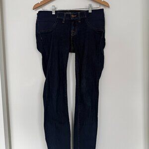 J Brand- Dark blue skinny jean with elastic side pocket area